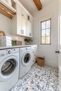 a washer and dryer in a small room