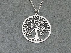 925 Silver Gold Tree Necklace, 14K Solid Gold Family Tree Necklace, Silver Tree Pendant, Life Necklace, Tree of Life Pendant, arbre de vie, Tree Of Life Gift, Gift for Grandmom, Gift for mom, silver Necklace, her Christmas gift, tree charm, Family Jewelry Gift This is a beautiful and dainty Tree Of Life Necklace.  It comes in sterling silver, gold Plated and rose gold Plated. 100% 925 Sterling Silver and 10k and 14K Solid Gold Sterling Silver Classic Tree Of Life Necklace A beautiful, dainty sil Christmas Gifts For Teen Girls, Tree Of Life Jewelry, Family Tree Necklace, Family Jewellery, Tree Necklace, Silver Tree, Tree Of Life Necklace, Anniversary Jewelry, Meaningful Jewelry