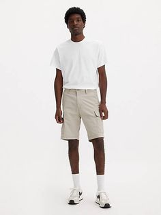 Hold everything;literally, in these comfortable Carrier Cargo Shorts with pockets and utilitarian style. They're cut with a relaxed fit and sit right at your waist, making them some of the easiest shorts in your closet. Comfortable shorts with utilitarian style Crafted with non-stretch fabric Reinforced pockets Reflective tape at the cuff U-lock storage at the waistband Levi's Relaxed Fit Shorts With Pockets, Levi's Relaxed Fit Shorts, Utilitarian Style, Comfortable Shorts, Reflective Tape, Levi Strauss & Co, Levi Strauss, Shorts With Pockets, Get Dressed