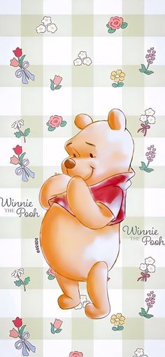 winnie the pooh is hugging her teddy bear with flowers on it's back