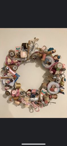 a wreath made out of buttons and other items