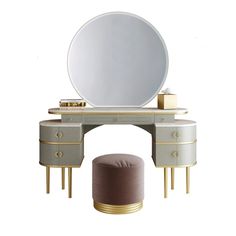 an oval mirror on top of a vanity with gold trimmings and two stools