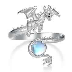 PRICES MAY VARY. Dragon Ring for Women: Inspired by a cute dragon, this moonstone dragon ring symbolizes strength, good luck and protection, making it a meaningful and stylish piece of jewelry. Perfect dragon ring for everyday wear, designed for those who love dragons. Adjustables Dragon Ring Material：Dragon jewelry is made of 925 sterling silver, the surface is glossy, not easy to rust or discolor, no lead, no nickel, hypoallergenic, does not harm the skin, durable and safe, can be worn for a l Moonstone Dragon, Fantasy Jewelry Magic, Dragon Earrings, Dragon Ring, Dragon Jewelry, Magic Ring, Gem Ring, Jewelry Images, Moonstone Jewelry