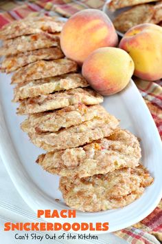 peach snickkerdoodles are stacked on a white plate