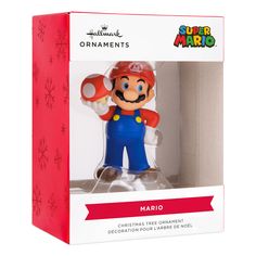 the nintendo super mario figure is in its box