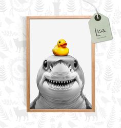 a rubber ducky sitting on top of a shark's head in front of a wall