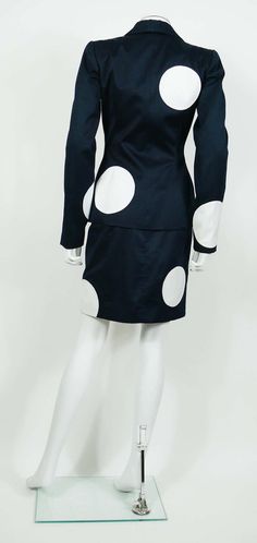 For Sale on 1stDibs - THIERRY MUGLER vintage dark blue bustier dress and blazer suit embellished with large applique white polkadots. BLAZER features : - Tailored fitted cut. Spring Fitted Skirt Suit With Button Closure, Retro Fitted Skirt Suit For Spring, Thierry Mugler, Bustier Dress, Blazer Dress, Blazer Suit, Polka Dot, Dark Blue, Polka Dots