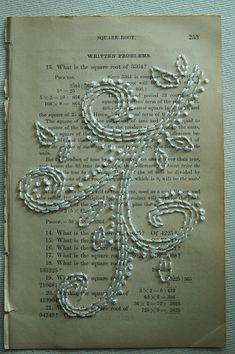 an old book with beads on it