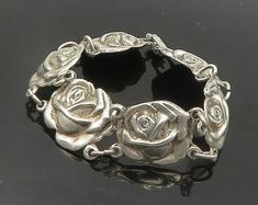 "925 Sterling Silver - Vintage Antique Rose Flower Link Chain Bracelet - BT7821  Jewelry Type:         Bracelet   Metal Type:            925 Silver  Metal Size:             7.5\" Length  .75\" Height   Stone Type:            N/A  Condition:              N/A  Jewelry Weight:     36.6 Grams  PLEASE NOTE: THIS ITEM IS PRE-OWNED. ALTHOUGH MOST ITEMS ARE IN VERY GOOD CONDITION, SOME MAY NEED CLEANING AND/OR MINOR REPAIRS. WE MAKE A VERY STRONG EFFORT TO UPLOAD CLEAR PICTURES. PLEASE INSPECT ALL PICTU Vintage Silver Jewelry With Roses, Formal Silver Jewelry With Rose Details, Bracelet Metal, Link Chain Bracelet, Antique Roses, Metal Bracelets, Antique Rings, Cute Jewelry, Link Chain