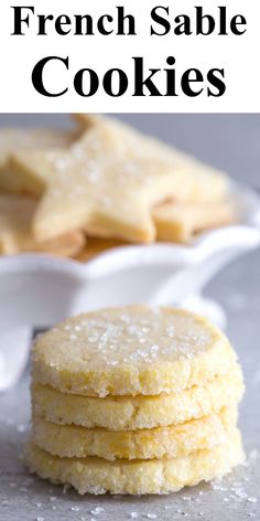 a stack of sugar cookies on top of a table