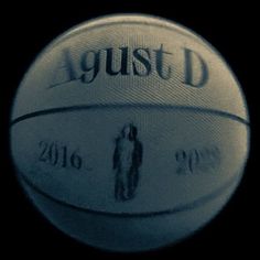 a close up view of a basketball with the words gust d on it's side