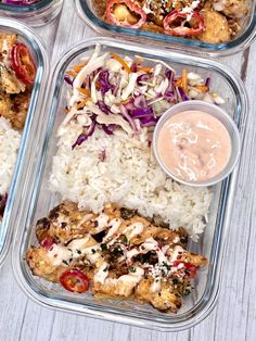 four plastic containers filled with rice, meat and veggies next to dipping sauce