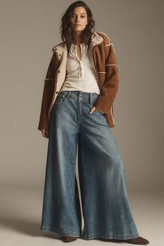 Denim, decoded: We’re digging denim in every corner of our closet, featuring a mid rise, five-pocket styling, and an ultra wide leg. | Dramazzo Mid-Rise Ultra Wide-Leg Jeans by Pilcro in Blue, Women's, Size: 24, Cotton/Elastane at Anthropologie Chic Medium Wash Wide Leg Pants For Fall, Retro Wide Leg Rigid Denim Jeans, Mid-rise Rigid Denim Bottoms With Belt Loops, Ultra Low Rise Jeans, Urban Wide-leg Jeans With Frayed Hem, Mid-rise Denim Wide Leg Pants With Frayed Hem, Selvedge Wide-leg Jeans In Rigid Denim, Ultra Wide, Chino Jeans