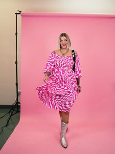 Unleash your inner punk rock princess in this flirty and fun Punk Rock Princess Checkered Midi Dress! Perfect for summer, it's flowy and breezy while still retaining an edgy, feminine vibe. Channel your rebellious spirit with this must-have addition to your wardrobe! -All over wavy, pink + white checkered pattern! -Stretchy, smocked fitted bust -Square neckline -Puff sleeves -- so cute! -Midi length -NO see through! -100% Rayon -Full length: 44" SIZING: The dress fits true to size. Alora is 5'8 Pink Barbiecore Mini Dress For Summer, Pink Barbiecore Summer Dress, Trendy Pink Beach Midi Dress, Trendy Pink Midi Beach Dress, Trendy Pink Midi Dress For Beach, Edgy Summer Midi Dress, Trendy Pink Midi Dress For Day Out, Pink Playful Mini Dress For Summer, Playful Pink Mini Dress For Summer