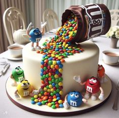 a cake decorated with candy and m & m candies