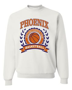 Phoenix Arizona PHX Hometown City Team Pride | Fantasy Basketball Fan Sports Merch Apparel, State Basketball, Sports Men's T-Shirt Pick a sport, any sport we've got you covered. From Football and Baseball to Table tennis and Horseback Riding whatever your passion we have a cool design for you to wear while to showing off your skills 👕 TOP QUALITY: Our shirts are made with a soft, pre-shrunk 50/50 cotton/polyester blend, ensuring maximum comfort and durability. We also use the newest, high-tech printing techniques available, guaranteeing the finest print on the market.⛹️⛹️⛹️ 👕 EASY CARE: Care for your t-shirts with ease, simply machine wash inside-out, cold with like colors. No complicated care instructions needed! ⛹️⛹️⛹️ 👕 SIZES AVAILABLE: Our t-shirts are designed to fit just about eve Crew Neck T-shirt For Sports Season, Collegiate Moisture-wicking Sweatshirt For Sports, Sporty Crewneck T-shirt For Sports, Sporty Crew Neck T-shirt For Sports, Sporty Sweatshirt With Team Logo, Sporty Sweatshirt With Team Logo For Sports, Collegiate Style Athletic Heather Sweatshirt For Sports, Collegiate Athletic Heather Sweatshirt For Sports, Team Spirit Moisture-wicking Sweatshirt For Sports Events