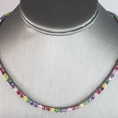 For Sale Is This Womens .925 Sterling Silver Modernist Rainbow Colored Glass Necklace. Necklace Weighs 25.6g. The Necklace Measures 18 3/4" Long By About 1/8" Wide. Makes A Great Gift For That Someone Special. If Any Questions, Please Ask. Be Sure To Check Out Our Other Items For Sale. Luxury Multicolor Necklaces For Anniversary, Multicolor Faceted Jewelry For Formal Occasions, Classic Multicolor Jewelry For Gifting, Classic Multicolor Jewelry For Gift, Classic Multicolor Jewelry Gift, Formal Multicolor Single Strand Jewelry, Multicolor Hallmarked Necklace For Anniversary, Formal Multicolor Gemstones In Sterling Silver, White Gold Sterling Silver Necklace With Multi-stone