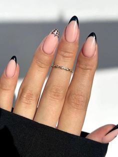 27 Jaw-Dropping November Nails You Will Adore All Month Long | Everygirl Edit Black And White Acrylic Nails French Tip, White Tip Acrylic Nails Almond Short, Oval Nails Medium Length, Medium Oval Nails Acrylic, Almond Shaped Acrylic Nails Designs, Monochrome French Tip Nails, Black And White Tip Nails, Short Nails Black Design, Nails Neutral Design