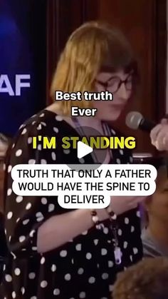 a woman standing in front of a microphone with words above her saying best truth ever i'm standing