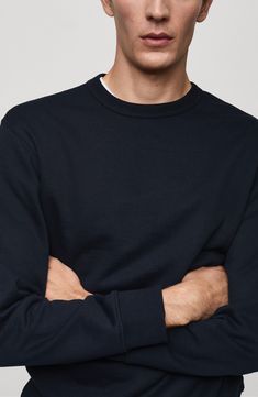 Comfy and put-together, this pullover sweatshirt is made from a plush cotton blend in a solid hue that offers a minimalist look. Crewneck Long sleeves 80% cotton, 20% polyester Machine wash, line dry Imported Cotton Sweater With Ribbed Cuffs For Work, Solid Cotton Sweats With Ribbed Collar, Modern Cotton Sweater, Modern Cotton Sweater For Layering, Modern Cotton Sweatshirt For Fall, Modern Crew Neck Sweatshirt With Ribbed Cuffs, Classic Cotton Sweatshirt With Ribbed Neckline, Modern Solid Crew Neck Sweater, Cotton Sweatshirt With Ribbed Neckline