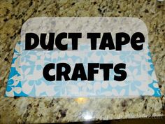 a blue and white sign that says duct tape crafts on the side of a counter