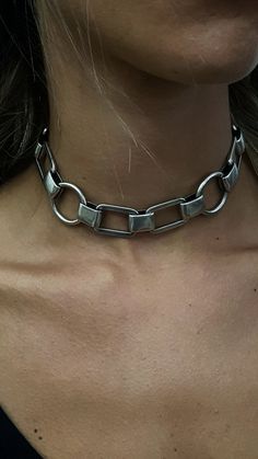 "♦ A choker necklace made of rectangular links and hoops, the choker is beautiful and gives a rockist look in a contemporary line. made from brass plated silver in very high quality. SIZE Length: 11.8\" (30cm) up to 15.8\"(40cm) width chain:0.78\" (2cm) up 0.86\" (2.2cm) You can see another model of a choker in the next link: https://etsy.me/2OoCzSq ♦ This piece of jewelry is perfect as a gift for yourself, for the wedding day, Valentine's day or a birthday. If you're interested in sending a gif Metal Link Choker With Chunky Chain, Modern Metal Choker With Chunky Chain, Modern Metal Chain Choker, Metal Link Choker, Edgy Metal Chain Link Choker, Trendy Chunky Metal Choker, Rocker Jewelry, Chunky Silver Jewellery, Edgy Necklace