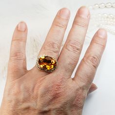 "Topaz Ring Yellow Topaz Cocktail Ring Amber Topaz Swarovski Crystal Bridesmaids Ring wedding Clear Halo Adjustable Oval Statement Ring,Silver,Topaz,SR46 A sparkly comfortable adjustable ring made with a large (13mm/18mm) Oval SWAROVSKI CRYSTALIZED™ ELEMENTS surrounded by sparkling small crystals. A special design from my studio, the stone is set horizontally. A statement ring, hard to ignore. some details : One large 13mm/18mm oval stone, complemented by small crystals around it. Overall stone Exquisite Topaz Ring With Diamond Accents, Classic Crystal Ring With Gemstone Accents For Anniversary, Gold Cushion Cut Topaz Ring For Formal Occasions, Formal Gold Cushion Cut Topaz Ring, Classic Topaz Crystal Ring With Gemstone, Classic Topaz Gemstone Rings, Citrine Center Stone Topaz Ring, Cushion Cut Topaz Ring With Gemstone Accents For Anniversary, Elegant Citrine Rings For Formal Occasions