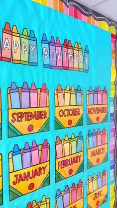 a bulletin board with crayons on it and the words happy birthday written in different colors