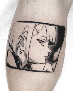 an artistic tattoo on the leg of a man