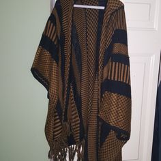 Brand New, Poncho Cardigan With Fringe Bottom Brown Fall Cape Outerwear, Brown Bohemian Cape Outerwear, Bohemian Brown Cape Outerwear, Oversized Brown Poncho Cape, Oversized Brown Cape Shawl, Brown Cape For Cold Weather, Casual Black Shawl Poncho, Brown Long Sleeve Outerwear, One Size, Casual One Size Brown Poncho