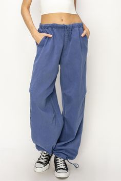 These Cobalt tie strap parachute pants effortlessly blend style and comfort. dropping from a mid rise waist with a drawstring closure for you to cinch the fit, the relaxed fit legs let you move with ease all throughout the day. pair with a tank top. Model wearing a size SM. Climbing Pants, Strap Pants, Style Clothes, Top Model, Parachute Pants, Cobalt, Climbing, Mid Rise, The Day