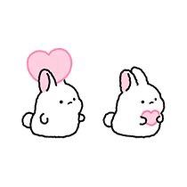 two rabbits with hearts in their ears and one has a pink heart on its head