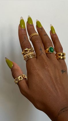 Gold Finger Claws, Chartreuse Green Nails, Post Malone Inspired Nails, Nails Aesthetic Pictures, Many Rings On Hand, Bronze Chrome Nails, Orange Gold Nails, Stacked Rings Aesthetic, Chartreuse Nails