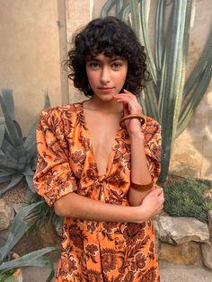 Nod to the '70s in this paisley print playsuit. Designed in an eye-catching hue and front-bow detailing, pair with sandals and a straw bag for a timeless boho look. Boho Look, Paisley Print, Straw Bag, Paisley