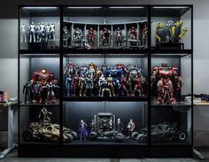 a display case filled with lots of action figures