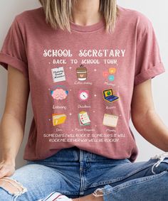 Kick off the school year with our School Secretary Shirt, featuring a fun and playful design perfect for the office. This Funny Back To School Tshirt is a Cute T-shirt Gift for School Secretary, combining humor and comfort. Ideal for any school receptionist, this Admin Squad Tee shows appreciation for their hard work and dedication. Product Description: ⇝ Bella and Canvas Brand Shirts ⇝ Unisex Adult Sizing ⇝ Rolled Sleeves in pictures are for styling purposes only ⇝ Props used in photos for are Teacher Team Shirts Business Casual, Cheap Funny School Shirt, Cheap Everyday T-shirt For Back To School, Cheap School Shirt With Funny Text, Staff Tshirts Funny, Cute Teacher Vinyl Shirts, Funny Tshirts For Teacher Assistants, Cheap Customizable T-shirt For Teacher Appreciation, Tee Shirts Staff Meeting Funny