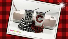 two tumblers sitting next to each other on a red and white checkered background