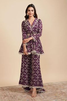 Purple three quarter sleeve flared jacket top, elevated with floral zari embroidery and pearl embellished hemline in scallop pattern. Paired with asymmetric flared hem pant, highlighted with floral embroidery. Component: 2 Pattern: Embroidery Type Of Work: Zari,Gota Neckline: Notched Collar Neck Sleeve Type: Three Quarter Sleeves Fabric: Vegan Silk Color: Purple Other Details:  Pearl laced hemline pant and sleeves Notched collar neckline Concealed placket Note: Belt worn by the model is not for Zari Embroidery, Frock Fashion, Traditional Outfit, Indian Dresses Traditional, Designer Party Wear Dresses, Boutique Dress Designs, Indian Dress, Stylish Party Dresses