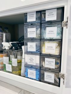 the drawers are organized with labels and containers