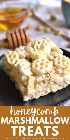 honeycomb marshmallow treats on a black plate