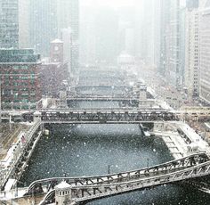 the city is covered in snow and it looks like it's going to fall