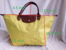 longchamp tote handbag longchamp le pliage,summer bag,womens bag, the handles are small, the material is nylon, the size of the bag is 44cm*26cm*19,5cm, there are scuffs on the corners of the bag,there are stains from the handle inside, the zipper works, there are stains and traces of wear, the color is beautiful yellow Foldable Travel Bag For Summer, Foldable Shoulder Bag For Shopping, Longchamp Crossbody Bag, Longchamp Crossbody, Longchamp Small, Longchamp Mini, Small Leather Backpack, Longchamp Tote, Longchamp Bag