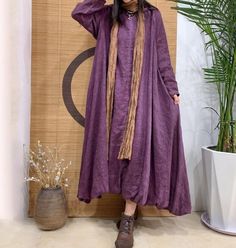 "【Fabric】 linen Lining  cotton 【Color】 Brown, peacock blue, purple 【Size】  Shoulder width is not limited Shoulder + Sleeve Length 68cm / 26\" Bust 130cm / 50\" Length 123cm / 47\" Washing & Care instructions: -Hand wash or gently machine washable do not tumble dry -Gentle wash cycle (40oC) -If you feel like ironing (although should not be necessary) , do it with steam or while the dress is still slightly wet -Do not bleach If you like this dress, perhaps you will also like other dresses from our Bohemian Solid Color Midi Dress, Solid Color Linen Maxi Dress, Bohemian Maxi Dress For Winter, Winter Bohemian Maxi Dress, Purple Long Dress For Winter, Long Purple Dress For Winter, Bohemian Long Sleeve Dress In Natural Fiber, Long Sleeve Purple Maxi Dress For Fall, Bohemian Linen Maxi Dress With Long Sleeves