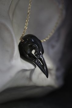 ** Raven Skull Necklace original design and made by Defy ** Another animal skull charm from our animal anatomy collections. The skull has nice handmade details in black tones. All the material is brass. - The skull dimensions : approx. 1.5 x 3.5 x 1.5 cm. - The necklace chain length : please choose from our options. - Weight : 14 g. **Shipping to World Wide** - Please allow us to prepare the item and parcel between 3-5 working days. (Between 7-10 working days For Special items / Sterling Silver Engraved Black Jewelry For Halloween, Black Engraved Jewelry For Halloween, Black Engraved Necklace For Halloween, Black Engraved Skull Jewelry, Black Skull Shaped Engraved Jewelry, Black Skull Engraved Jewelry, Black Skull-shaped Engraved Jewelry, Bird Skull Jewelry, Gold Raven Skull Necklace