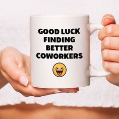 a woman holding a coffee mug with the words good luck finding better coworkers