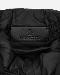 Moncler Small Legere Crossbody Bag Black.A smaller variant of the classic Moncler tote, the Legere cross body bag is crafted from nylon. Easily styled on the shoulder or across the body, the small accessory has enough room for your essentials..100% Polyamide.Down-Filled.Water-Repellent Nylon Fabric.Calf Leather Trim.Adjustable Shoulder Strap.Silicone Logo Patch at Front.Style Code: 5L00003M2170 999 Luxury Nylon Shoulder Bag With Top Handle, Luxury Nylon Crossbody Bag, Crossbody Bag Black, Men's Bags, Nylon Fabric, Small Accessories, Black Cross Body Bag, Cross Body Bag, Leather Trim