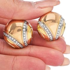 These clip-back diamond earrings By Dario are artfully rendered in high polished solid 18K Tricolor gold. These Circular-Shape earrings set with high-quality round diamonds set in18k white gold weighing approx. 1.45 carats G-H color, VS clarity Featuring non- posts clip-backs, these stylish Bvlgari earrings are designed for pierced and non pierced ears. in pristine condition Signed By Dario Weight: 25.5 grams Measurements: 23 mm diameter Accompanied by professional appraisal document. Luxury Yellow Gold Clip-on Diamond Earrings, Luxury White Gold Clip-on Diamond Earrings, Classic Clip-on Diamond Earrings, White Gold Clip-on Diamond Earrings For Formal Events, Formal Clip-on Diamond Earrings, Formal White Gold Clip-on Diamond Earrings, Yellow Gold Diamond Clip-on Earrings For Evening, Luxury Clip-on Diamond Earrings For Formal Occasions, Luxury Clip-on Diamond Earrings For Formal Events