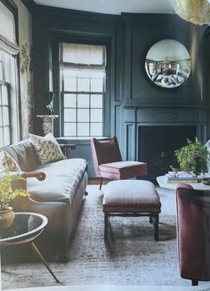 a living room filled with furniture and a fire place