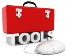 a red toolbox sitting next to a computer mouse on top of the word tools