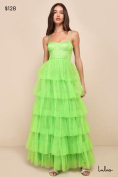 Treat any event like your own personal fashion show when you're wearing a show-stopping look like the Lulus Rule the Runway Lime Green Tulle Bustier Tiered Maxi Dress! This stunning dress is composed of sheer mesh tulle (atop a stretch knit lining) that shapes an alluring bustier-inspired bodice with seamed cups and supportive boning, a sweetheart neckline, and adjustable spaghetti straps. The high, fitted waist tops an A-line maxi skirt, adorned with fluffy tiers of tulle that are sure to make you look ""tulle-y"" mesmerizing as you dance the night away! Hidden back zipper/clasp. Fit: This garment fits true to size. Length: Floor length. Size medium measures 54.50" from shoulder to hem. Bust: Great for any cup size. Waist: Fitted - very fitted at natural waist. Hip: Not Fitted - fuller sk Green Fitted Corset Dress For Evening, Summer Tulle Evening Dress Fitted, Fitted Tulle Evening Dress For Summer, Green Corset Dress For Prom Party, Green Corset Dress For Prom Season Party, Green Fitted Corset Dress For Gala, Fitted Green Corset Dress For Gala, Organza Corset Dress For Spring Party, Fitted Floor-length Spring Corset Dress